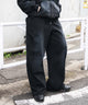 グラフィックスウェットパンツ/ブラック　モデル:180cm L着用